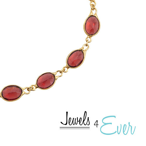 14kt Yellow Gold 7 x  5 mm genuine Garnet Bracelet