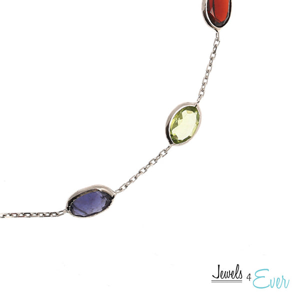 14kt White Gold Bracelet set with 7 x 5 mm genuine Gemstones