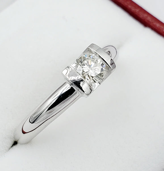 14kt white gold ring with one prong set round brilliant cut diamond 0.35cts